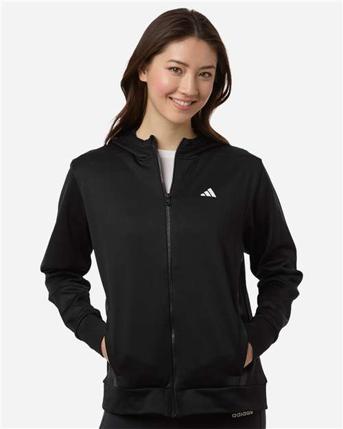 adidas AT209 Women's Game & Go Fleece Full-Zip Hooded Sweatshirt - Black/ White - OnModelFront