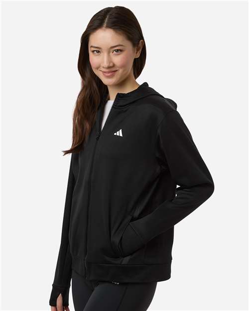 adidas AT209 Women's Game & Go Fleece Full-Zip Hooded Sweatshirt - Black/ White - OnModelSide