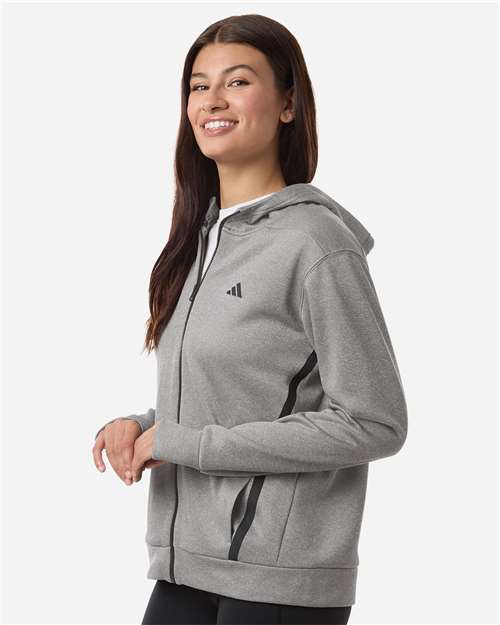 adidas AT209 Women's Game & Go Fleece Full-Zip Hooded Sweatshirt - Medium Grey Heather/ Black - OnModelSide