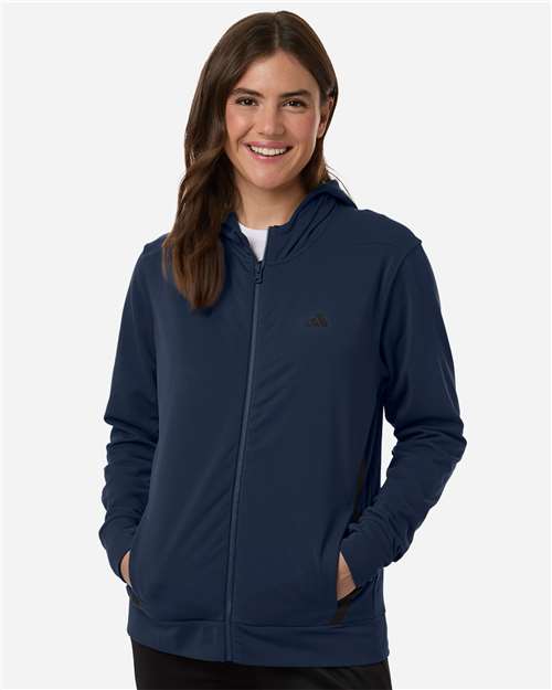 adidas AT209 Women's Game & Go Fleece Full-Zip Hooded Sweatshirt - Team Navy Blue/ Black - OnModelFront