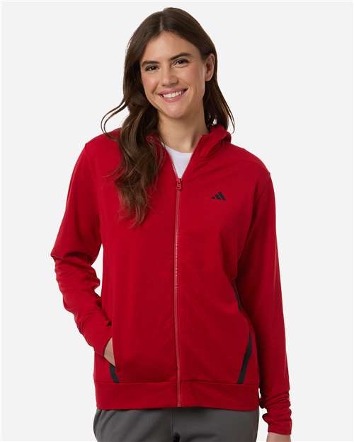 adidas AT209 Women's Game & Go Fleece Full-Zip Hooded Sweatshirt - Team Power Red/ Black - OnModelFront