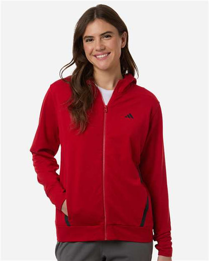 adidas AT209 Women's Game & Go Fleece Full-Zip Hooded Sweatshirt - Team Power Red/ Black - OnModelFront