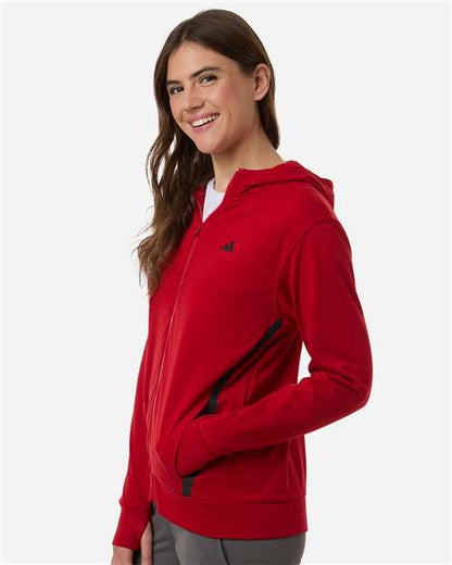 adidas AT209 Women's Game & Go Fleece Full-Zip Hooded Sweatshirt - Team Power Red/ Black - OnModelSide